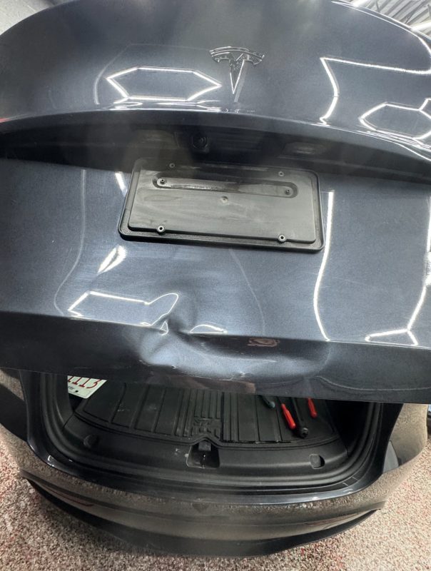 Paintless Dent Repair (PDR) before — 2022 Tesla Model Y, Calgary