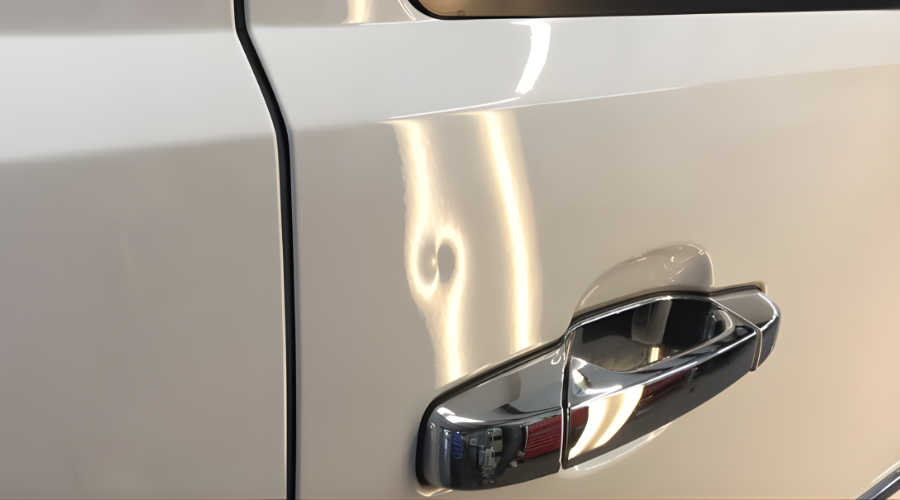 Door dings and small dent repair with paintless dent repair at X Detailing Calgary